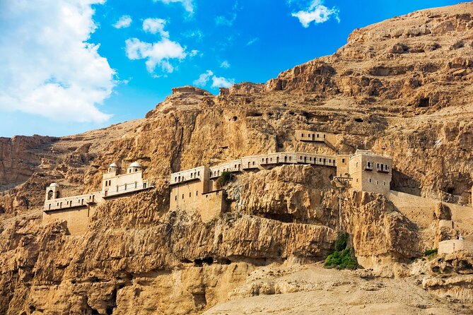 Bethlehem, Jericho & Jordan River Tour from Jerusalem - Guide quality and the large-group trade-off