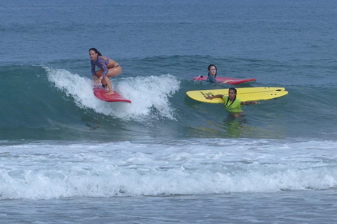 Professional Surfing lessons in the heart of Tel Aviv - Getting fitted with the right board and wetsuit