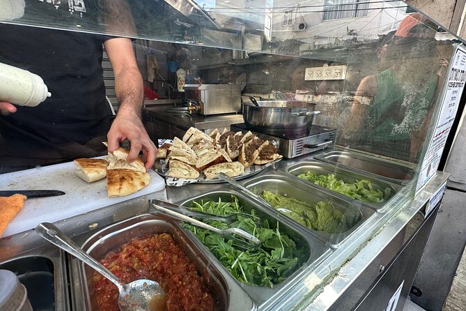 Tel Aviv: Carmel Market Food Tasting Tour “Shuk Hacarmel” - How the 90-minute timing affects the experience