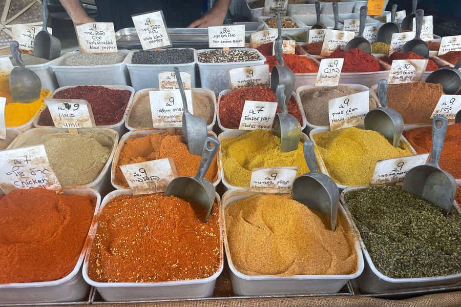 Tel Aviv: Carmel Market & Neighborhood Guided Walking Tour - Start at Poli House, where the market meets Allenby Street