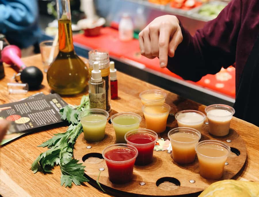Tel Aviv: Carmel Market & Tel Aviv Tour with Tastings - Herzl Street and Rothschild Boulevard with local context