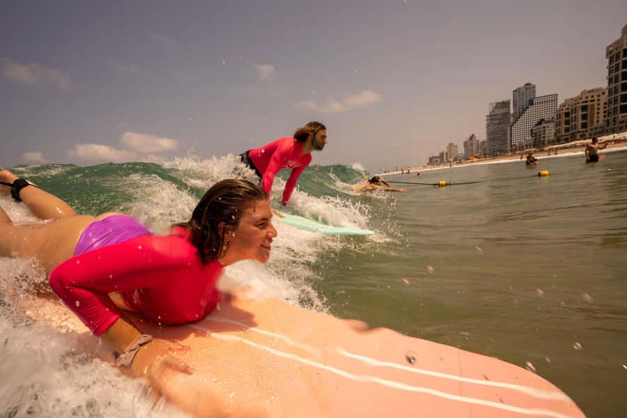 Tel Aviv: Professional Surfing Lessons at Beach Club TLV - Soft-top boards and wetsuits for a gentler first try